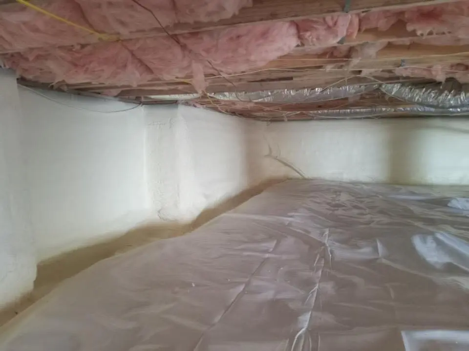 Crawl space encapsulation with closed-cell spray foam for Commercial Roof Restoration in Flagler Beach